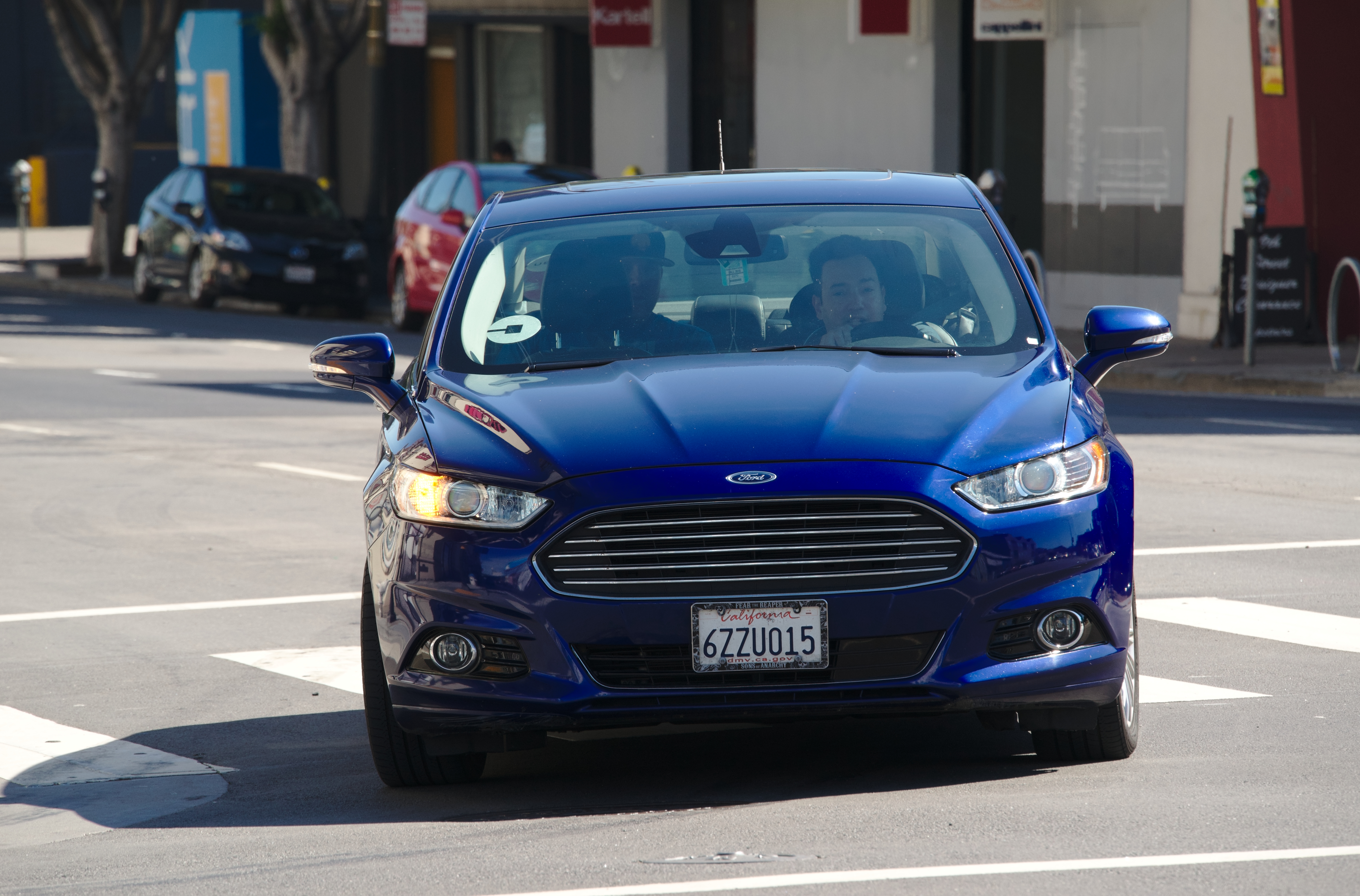 A second generation Ford Fusion driving around San Francisco. The driver seems to be driving for Uber.